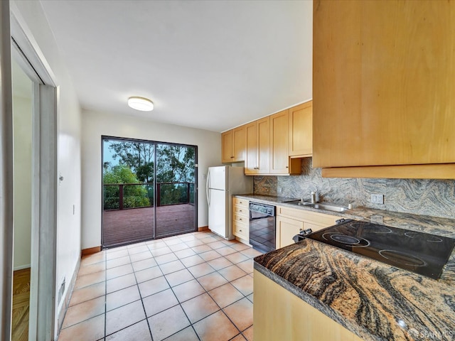 173 Warren Dr, San Francisco, CA 94131 - kitchen featuring freestanding refrigerator, black dishwasher, backsplash, light tile patterned floors, and range