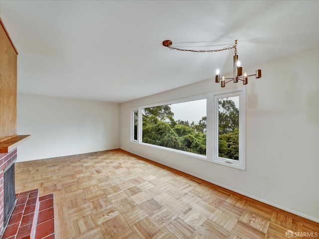 173 Warren Dr, San Francisco, CA 94131 - unfurnished living room featuring a chandelier and a fireplace