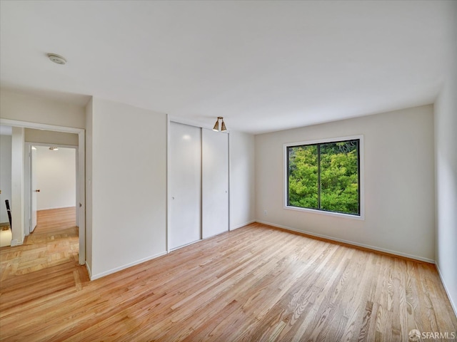 173 Warren Dr, San Francisco, CA 94131 - unfurnished bedroom featuring a closet and wood finished floors