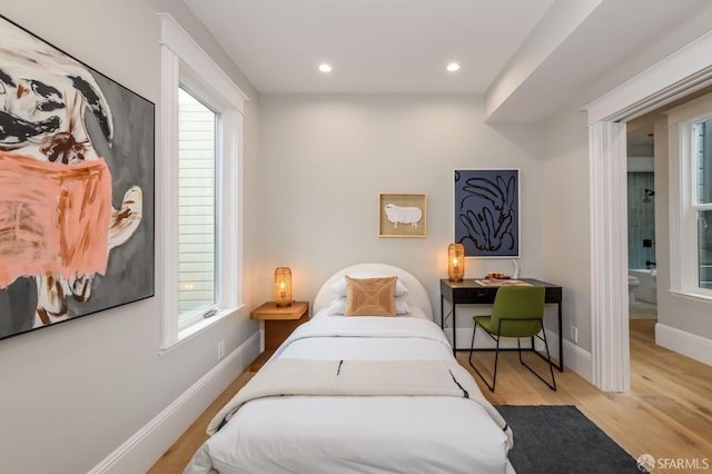 bedroom featuring light hardwood / wood-style flooring