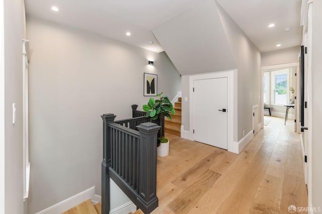 hallway with light wood-type flooring