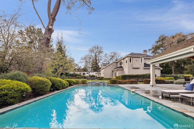 view of pool with a patio area