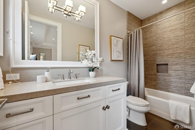 full bathroom featuring tile patterned floors, shower / tub combo with curtain, vanity, and toilet