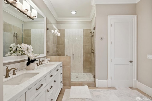 bathroom featuring ornamental molding, vanity, and a shower with shower door