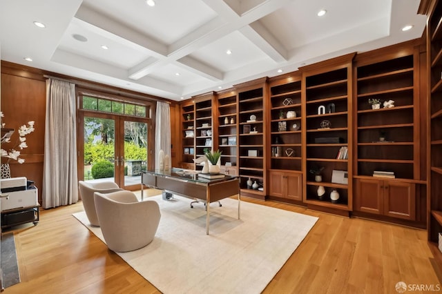 office with beam ceiling, french doors, light hardwood / wood-style floors, and coffered ceiling