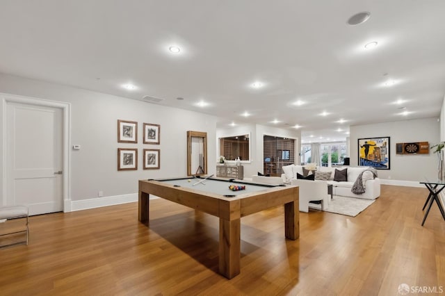 recreation room with light hardwood / wood-style floors and pool table