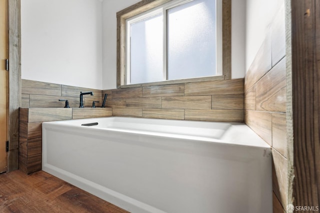 bathroom with wood finished floors