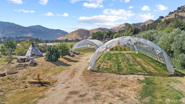 view of mountain feature featuring a rural view