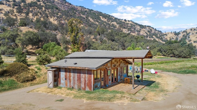 exterior space with a mountain view