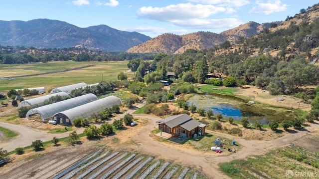 aerial view featuring a mountain view and a rural view