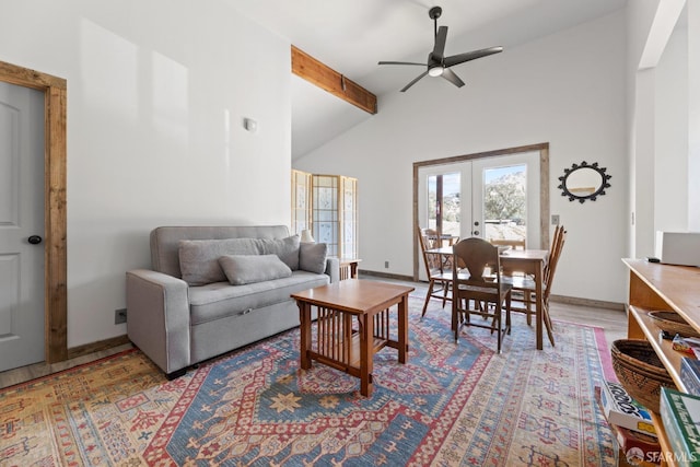 living room featuring wood-type flooring, french doors, high vaulted ceiling, ceiling fan, and beam ceiling