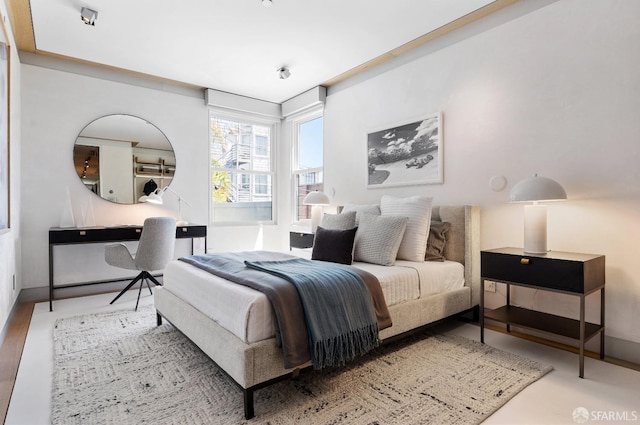 bedroom featuring hardwood / wood-style floors