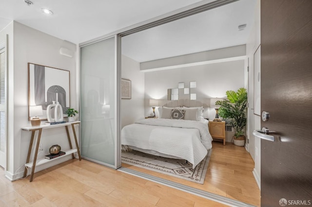 bedroom featuring light wood-type flooring