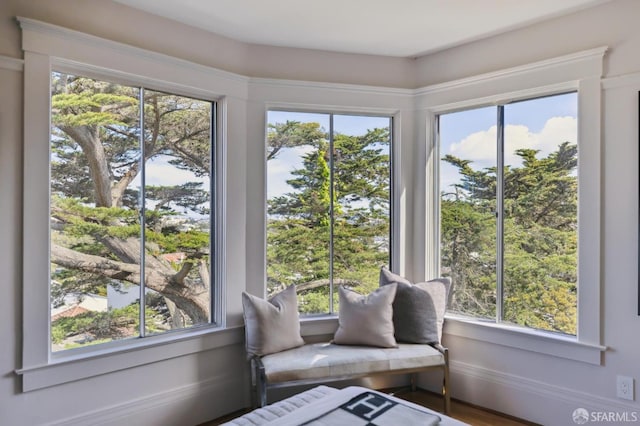 unfurnished sunroom featuring a wealth of natural light