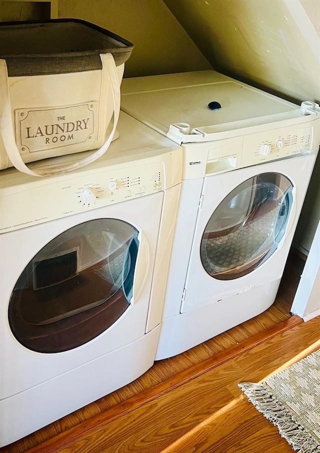 22 NE Selfridge St, Vallejo, CA 94590 - washroom featuring washer and clothes dryer and wood finished floors