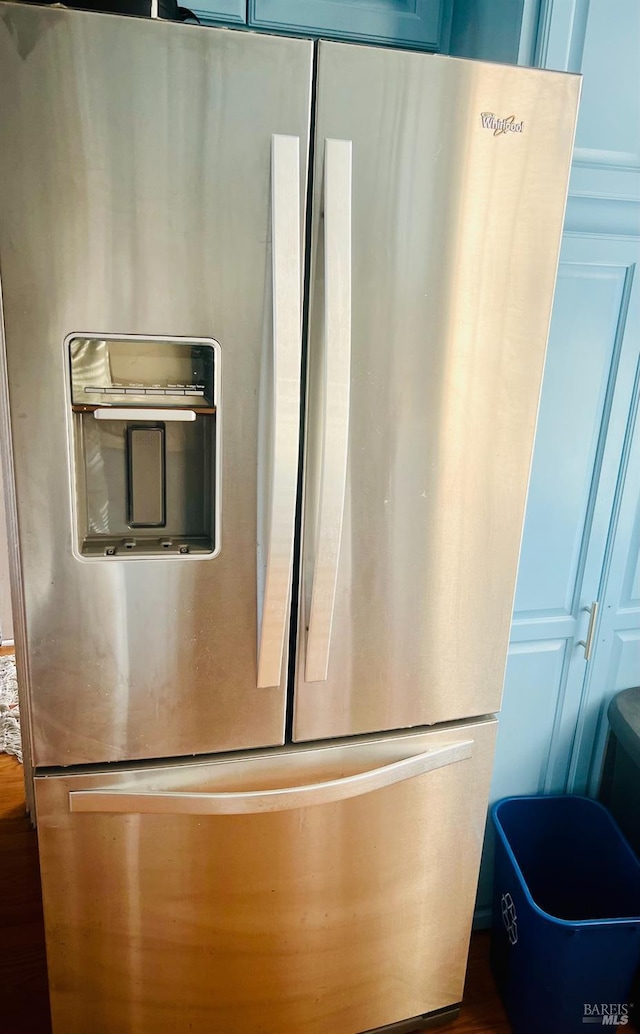 22 NE Selfridge St, Vallejo, CA 94590 - kitchen view of stainless steel fridge and blue cabinetry