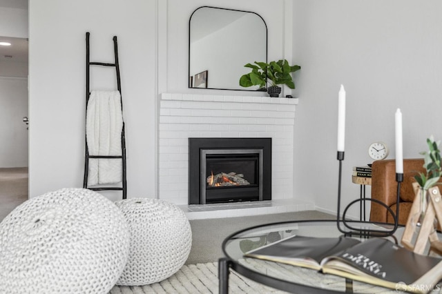 living room featuring a fireplace