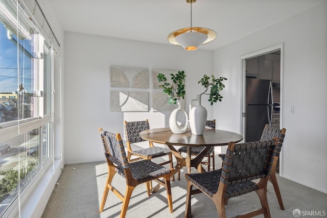 view of carpeted dining room