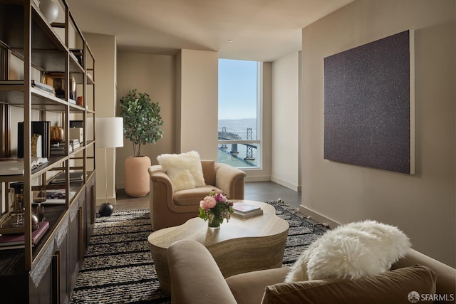 488 Folsom St Unit 5501, San Francisco, CA 94105 - sitting room with dark wood finished floors and baseboards
