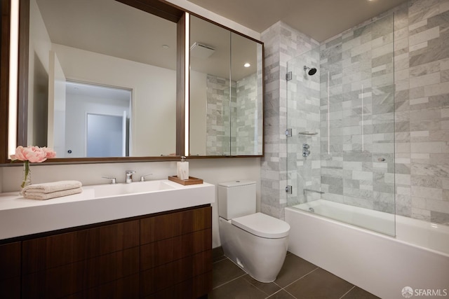 488 Folsom St Unit 5501, San Francisco, CA 94105 - bathroom featuring toilet, vanity, bath / shower combo with glass door, and tile patterned flooring