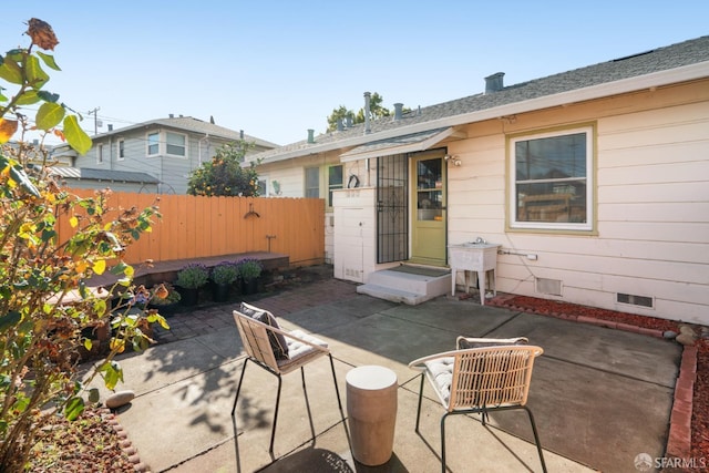 view of patio / terrace with fence