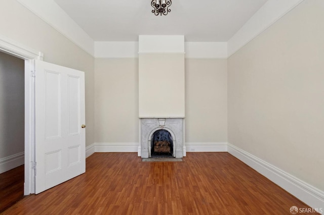 unfurnished living room featuring hardwood / wood-style floors