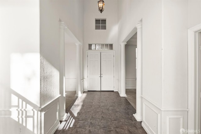 hallway with a towering ceiling