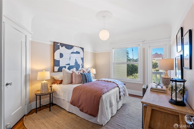 bedroom featuring hardwood / wood-style floors