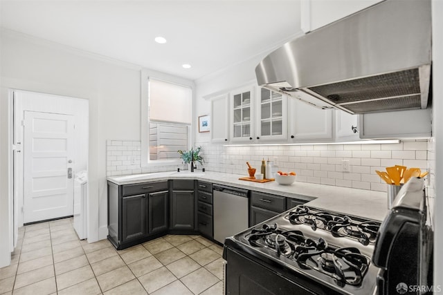 kitchen featuring white cabinets, stainless steel dishwasher, black range with gas cooktop, light tile patterned floors, and crown molding