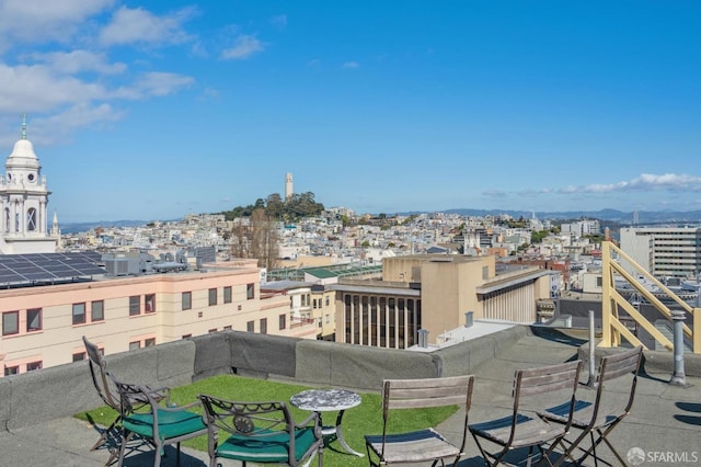 balcony featuring a view of city