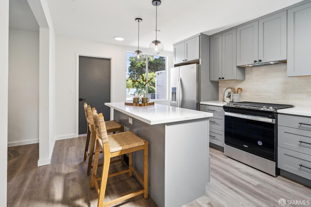 363 Prague St, San Francisco, CA 94112 - kitchen featuring electric range, gray cabinetry, refrigerator with ice dispenser, light wood-style flooring, and recessed lighting