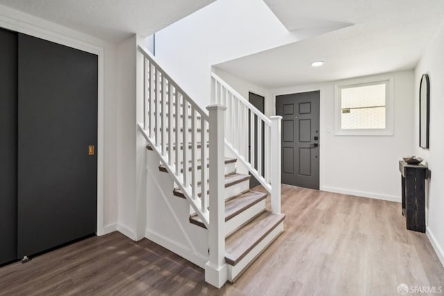 363 Prague St, San Francisco, CA 94112 - foyer featuring wood finished floors and stairs