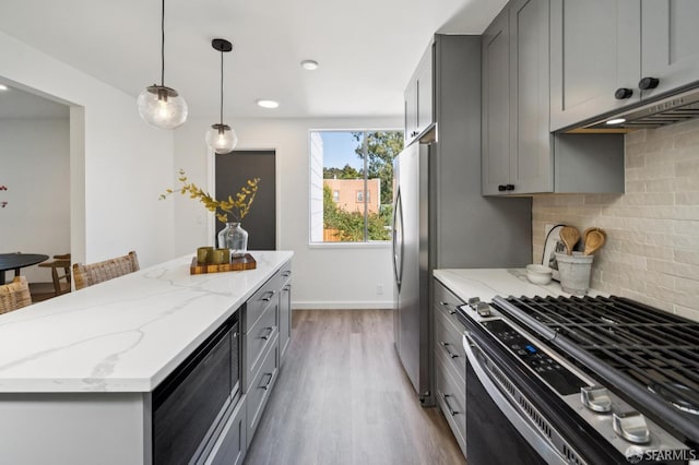 363 Prague St, San Francisco, CA 94112 - kitchen with stainless steel appliances, gray cabinetry, a kitchen island, and recessed lighting