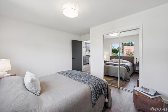 363 Prague St, San Francisco, CA 94112 - bedroom with wood finished floors and a closet