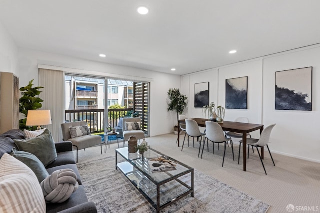 living room featuring french doors and light colored carpet