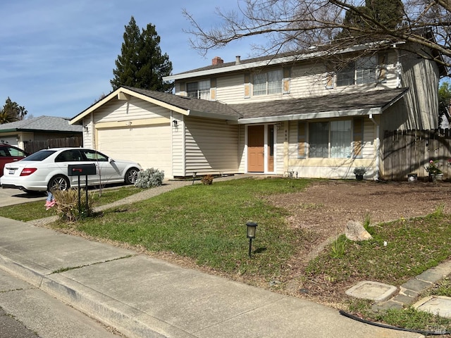 traditional-style house with driveway, a front lawn, an attached garage, and a shingled roof