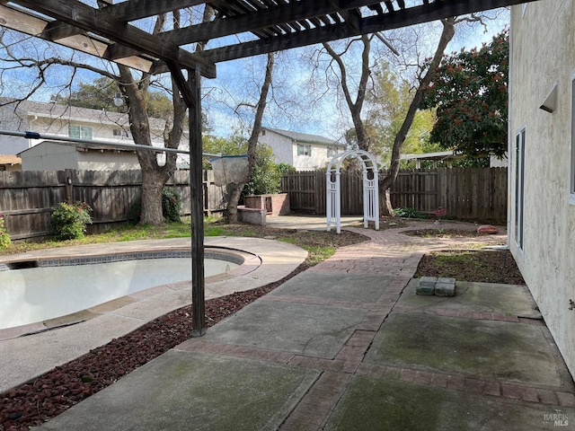 view of patio with a fenced backyard and a pergola