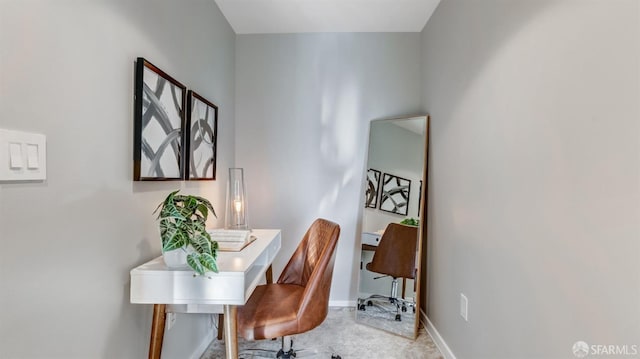 office featuring carpet and baseboards