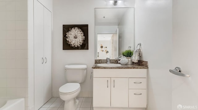 full bath with toilet, a tub, tile patterned flooring, and vanity