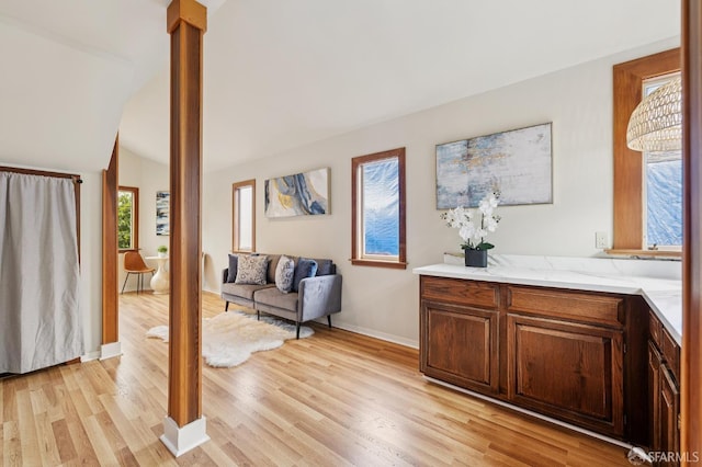 1285 Holloway Ave, San Francisco, CA 94132 - living room with light wood finished floors and lofted ceiling