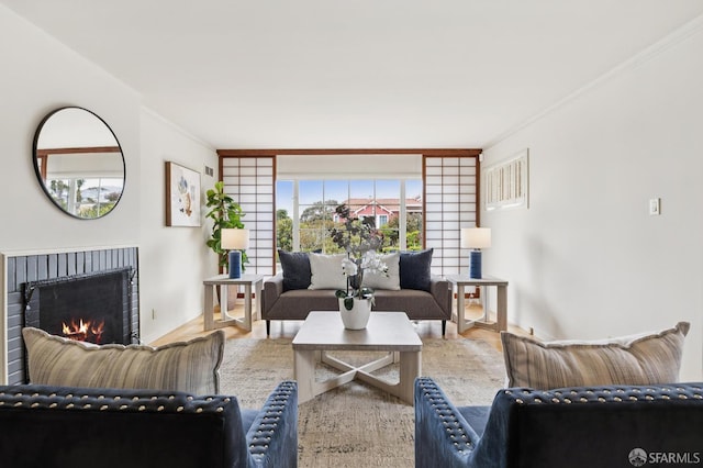 1285 Holloway Ave, San Francisco, CA 94132 - living room featuring crown molding, a fireplace, and wood finished floors