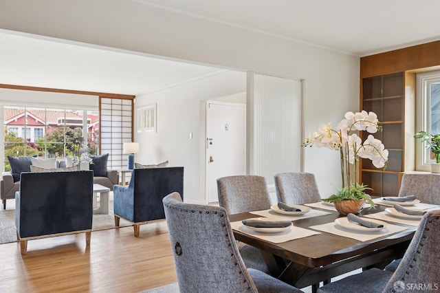 1285 Holloway Ave, San Francisco, CA 94132 - dining space featuring light wood finished floors and crown molding