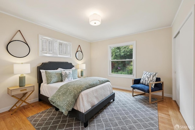 1285 Holloway Ave, San Francisco, CA 94132 - bedroom featuring crown molding, wood finished floors, and a closet