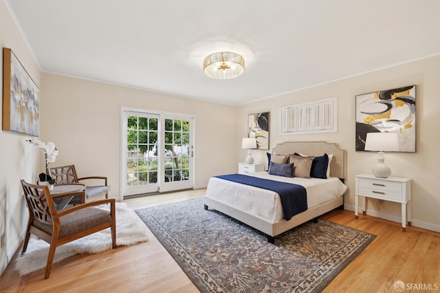 1285 Holloway Ave, San Francisco, CA 94132 - bedroom with wood finished floors, access to outside, a chandelier, and crown molding