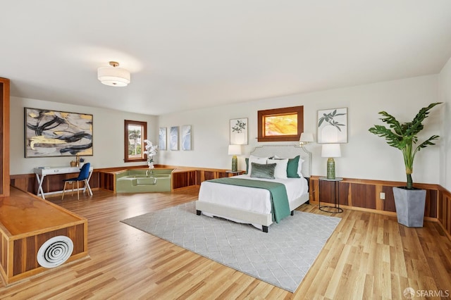 1285 Holloway Ave, San Francisco, CA 94132 - bedroom featuring wood finished floors and a wainscoted wall
