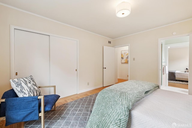 1285 Holloway Ave, San Francisco, CA 94132 - bedroom featuring a closet, crown molding, and wood finished floors