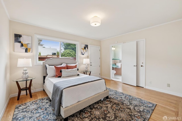 1285 Holloway Ave, San Francisco, CA 94132 - bedroom with wood finished floors, ensuite bathroom, and ornamental molding