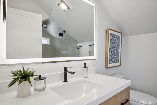 102 Baker St Unit A, San Francisco, CA 94117 - bathroom with vaulted ceiling, a shower stall, and vanity