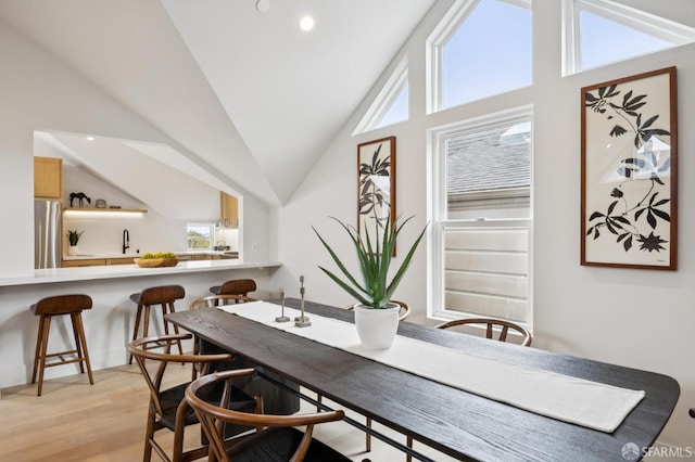 102 Baker St Unit A, San Francisco, CA 94117 - dining room with vaulted ceiling, light wood finished floors, and recessed lighting