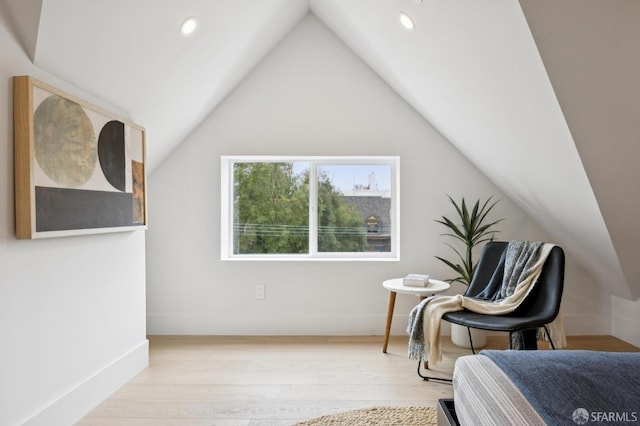102 Baker St Unit A, San Francisco, CA 94117 - sitting room featuring wood finished floors, vaulted ceiling, and recessed lighting